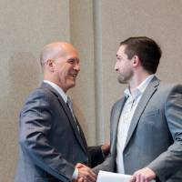 Associate Vice-Provost for the Graduate School, Dr. Jeffrey Potteiger (left), shaking hands with GSA President, Tom Worm (right).